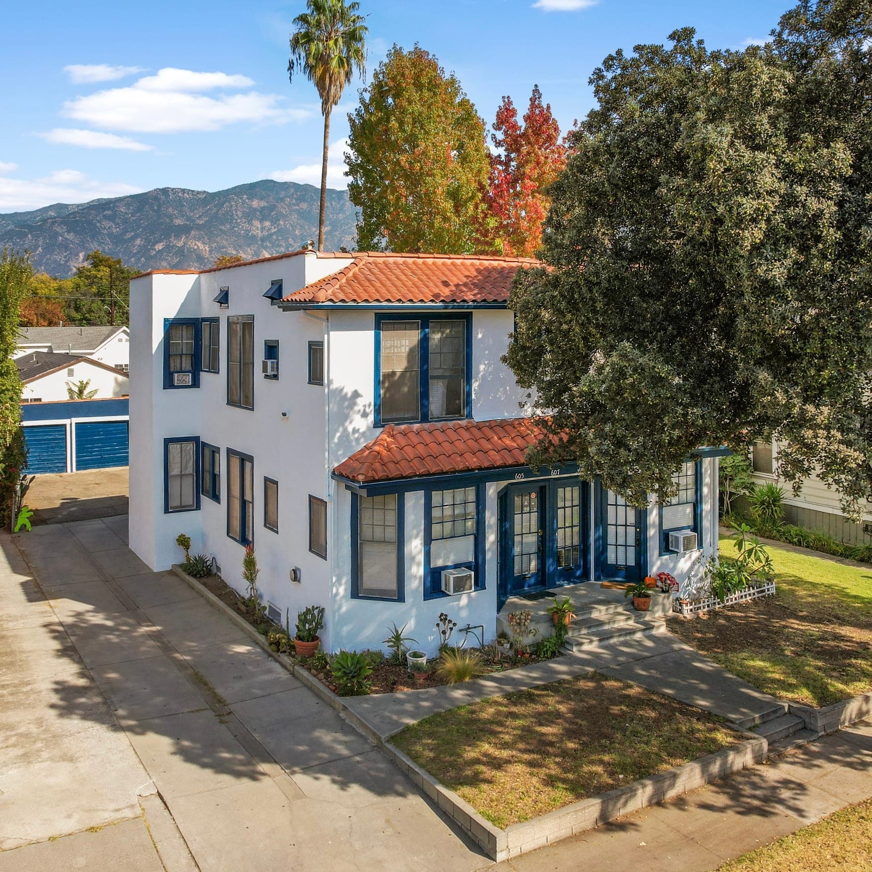 Two-story Spanish-style property beneath the San Gabriel Mountains