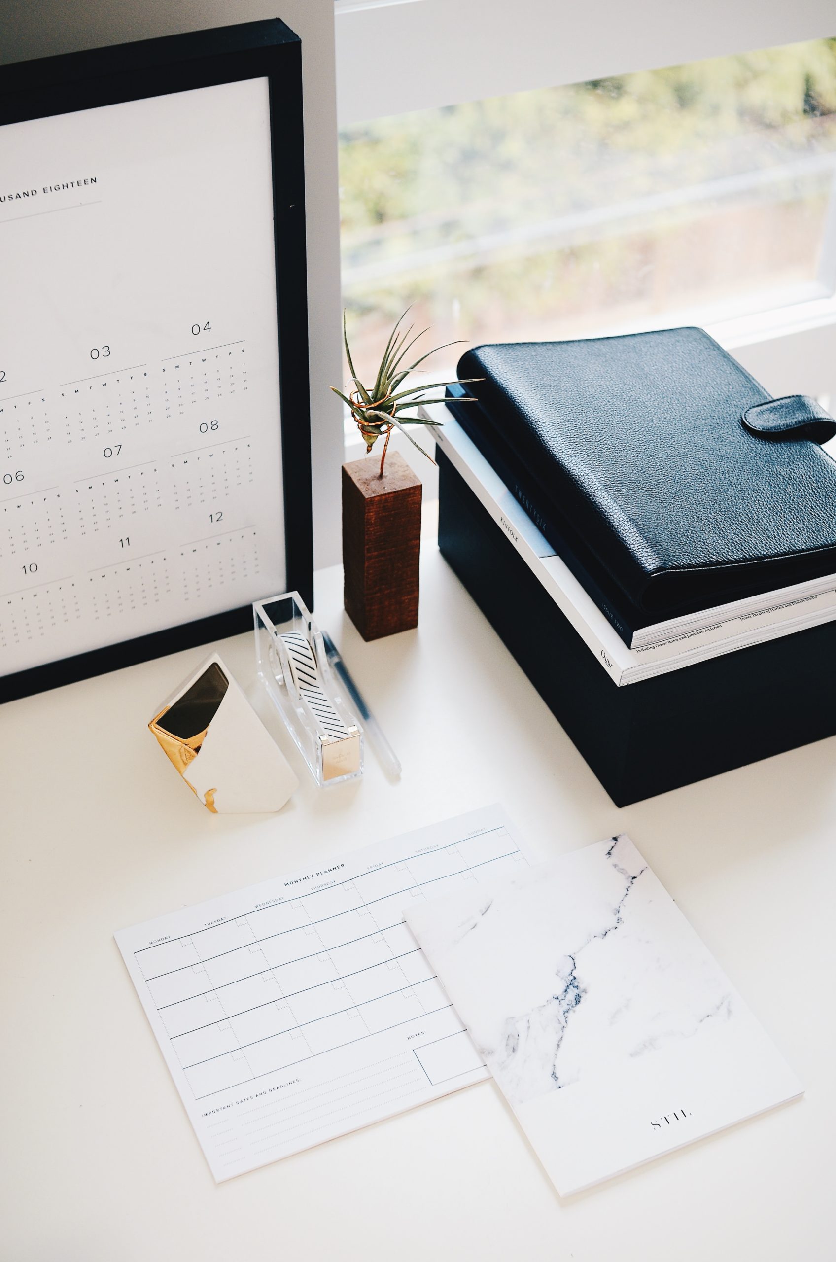 Desk with calendar on computer